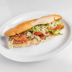 Baguette de 10 po &agrave; la saucisse italienne avec mozzarella, provolone, oignons caram&eacute;lis&eacute;s, aubergines et l&eacute;gumes