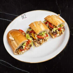 Italian cuisine steak baguette Italian cuisine steak baguette with mozzarella, provolone, onions, mushrooms, eggplant, lettuce and tomato