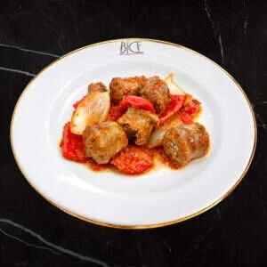 Italian sausage peperonata Italian sausage peperonata with bell peppers, caramelized onions, and basil, a hearty Italian cuisine specialty